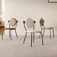 Chaise de salle à manger moderne en similicuir rembourrée avec dossier rond pour salle à manger et restaurant