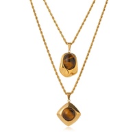 Collier pour femme en acier inoxydable style rétro, design géométrique irrégulier, avec pierre œil de tigre et bambou