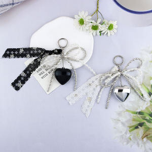 พวงกุญแจรูปหัวใจทำจากเรซินรูปโบว์ลูกปัดมุกพื้นผิวใหม่กระเป๋าใส่โทรศัพท์อุปกรณ์เสริมอเนกประสงค์ - Product Image 2