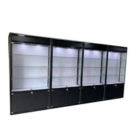 Vitrine de magasin de bijoux en verre, fabriquée en usine, avec cadre en alliage de titane noir, verrouillable, éclairée par LED, écologique et personnalisable