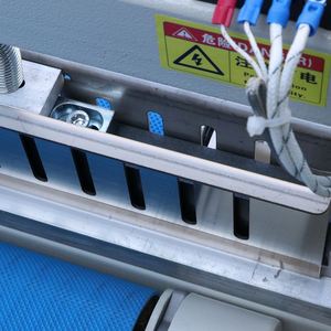 Machine d'emballage sous film PE thermorétractable pour boîtes en carton et boîtes à bulles de grande taille - Product Image 4