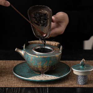 Teiera per camino teiera Color oro e argento teiera con manico ad anello Teakettle <span class=keywords><strong>in</strong></span> <span class=keywords><strong>ceramica</strong></span> giapponese Set da tè Kung Fu dispositivo per la preparazione del tè - Product Image 2