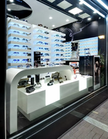 Vitrine d'exposition de lunettes de soleil optiques en promotion avec éclairage LED pour magasins de détail - Design moderne et tendance