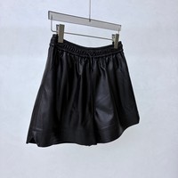 Shorts en cuir noir classiques pour femmes, taille élastique, cordon de serrage, poches discrètes, pantalon en cuir décontracté, style urbain quotidien