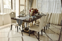Meubles de villa de luxe haut de gamme, table à manger moderne personnalisée en acier inoxydable, marbre noir de 12 mm d'épaisseur, 8 places