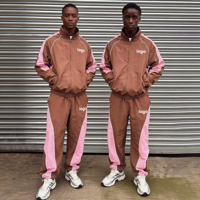 Ensemble de survêtement de sport personnalisé en deux pièces, style streetwear, en nylon avec piping réfléchissant, veste coupe-vent et pantalon de jogging
