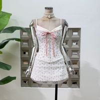 Nouvelle Collection Été Vêtements Femme : Ensemble Deux Pièces Haut Bustier à Nœud Floral et Jupe à Motif Arête de Poisson