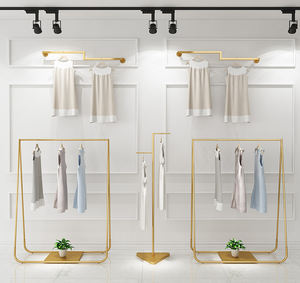 Estante de pared de Ropa de Oro boutique de lujo moderno Constom con mesa de anidación estantería de ropa ideal para muebles de <span class=keywords><strong>tienda</strong></span> de ropa - Product Image 4