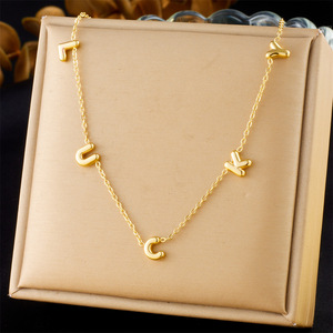 สร้อยคอโช้คเกอร์ลายตัวหนังสือนำโชคระดับเริ่มต้นทำจากสเตนเลสสีทองกันน้ำ - Product Image 2