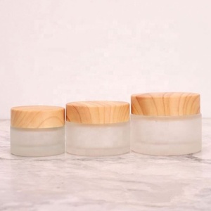 China High End <b>Clear</b> Frosted Glass Cream Jar <b>Container</b> Bamboo Cap Luxury Glass Jar With Wood Lid 30ml 50ml 100ml - Product Image 4