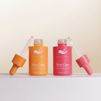 Flacon compte-gouttes en verre personnalisé rose de luxe de 30ml boîte de conteneur de dose de goutte oculaire cosmétique vide pour le sérum et l'huile essentielle de soins de la peau
