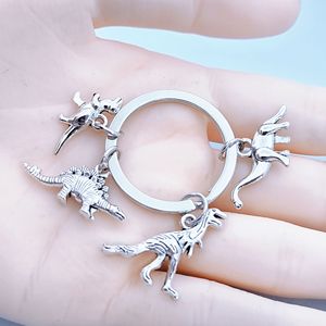 Llavero de Dinosaurio de Aleación de Zinc, Lindo Juego de <span class=keywords><strong>4</strong></span> Mini Dijes de Dinosaurio, Llavero de Moda con Animales para Bolsos, Carteras y Accesorios para Llaves de Coche - Product Image 3