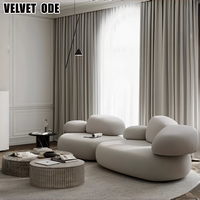 Nouveauté Canapé en tissu de luxe haut de gamme en forme de galet Cadre en bois massif Structure robuste Meubles durables pour villa et appartement