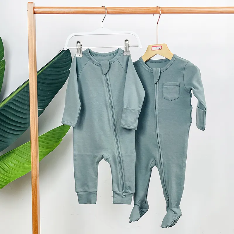 Combinaison neutre de genre OEM pour bébé Combinaison avec fermeture éclair pour nouveau-né Vêtements pour bébé Pyjama uni à manches longues en coton biologique Grenouillère pour bébé