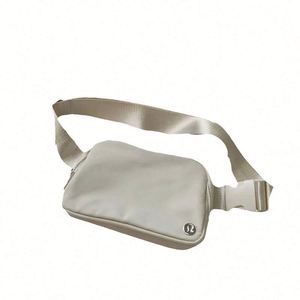 Nouvelle sacoche unisexe élégante et simple, sac banane coloré avec impression de logo, en tissu doux/coton, idéal pour les voyages quotidiens et les activités de plein air - Product Image 1