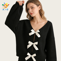 Vêtements pour femmes en gros d'usine : Cardigan élégant en polyester à col en V avec nœud, couleur unie, aspect tricoté en laine, séchage rapide et respirant