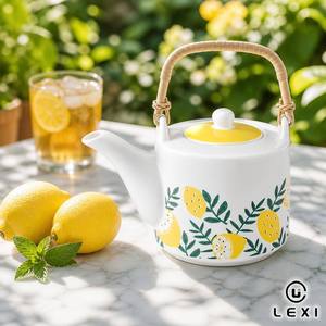 Service à <span class=keywords><strong>thé</strong></span> en porcelaine avec poignée en rotin, capacité 500 ml, théière, deux tasses, imprimé feuille de citron jaune, corps menthe, plateau de service en bois - Product Image 1