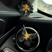 Diffuseur de parfum de luxe noir en résine pour voiture, clip de ventilation, parfum freesia, décoratif, longue durée, pierre parfumée naturelle