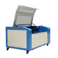 Machine de découpe et de gravure au laser CO2 400*600mm pour matériaux non métalliques comme le bois, la pierre, le bambou, le caoutchouc, l'acrylique et le verre organique 50W 60w 80w 100w