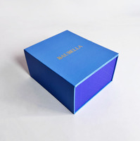 Boîte cadeau de luxe rigide personnalisée en carton pour parfum, avec insert en mousse EVA noire, fermeture magnétique, design à rabat, gaufrage et pelliculage mat