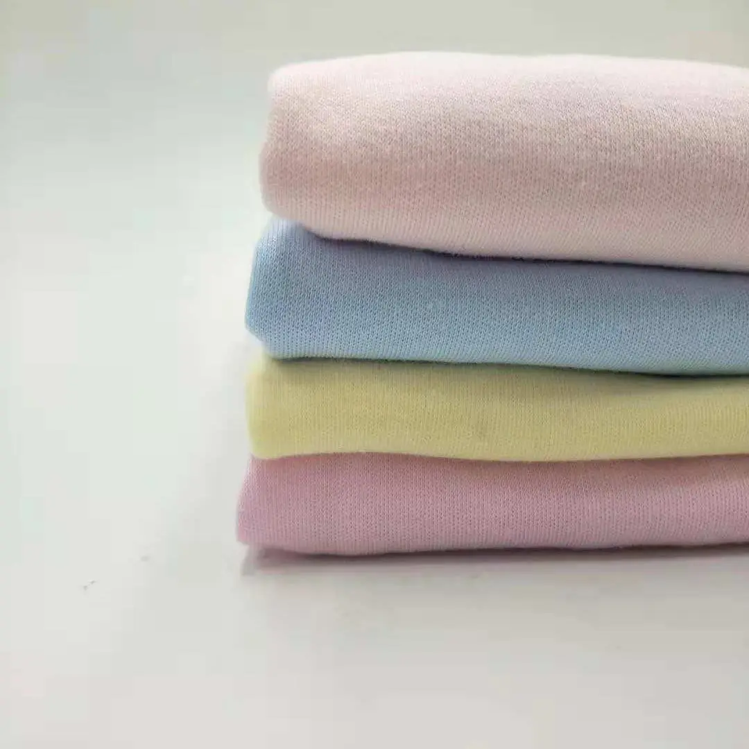 Kleine MOQ Mix Farben Großhandel Baumwolle glatt gefärbtes Jersey Inter lock Stricks toff für Baby kleidung