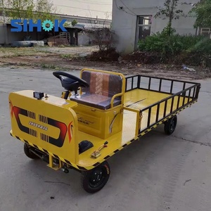 Carro Eléctrico de Plataforma para Mover Mercancías en Almacén, de 4 Ruedas, Resistente, con Volante, a Buen Precio - Product Image 1