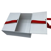 Boîte en papier de luxe en carton recyclable avec logo personnalisé en vente libre avec nœud en ruban pour vêtements Boîte d'emballage pour chaussures Boîte cadeau
