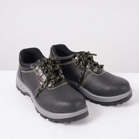 Chaussures de travail en cuir résistantes aux perforations avec embout en acier pour la sécurité sur les chantiers de construction