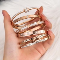 Bracelet en acier inoxydable serti de diamants haut de gamme personnalisé, logo OEM sur mesure