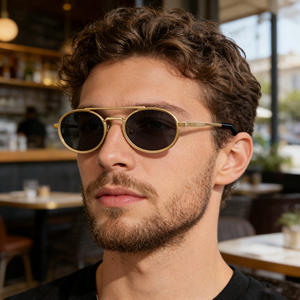 Gafas de Sol con Marco Ovalado KSL-98284 Unisex, Lentes de PC con Protección UV400, Marco Negro de Plástico y Metal, Diseño de Alta Gama con Resorte - Product Image 1