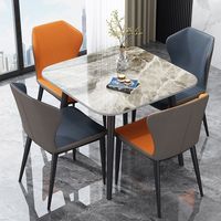 Ensemble table et chaises de salle à manger extensible en dalle de pierre moderne de luxe avec pieds en acier au carbone, table de salle à manger compacte pour salon