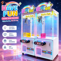 Meilleur Prix : Machine de jeu d'arcade à griffes lumineuse et colorée, machine de capture de cadeaux et de poupées tendance pour centre de jeux