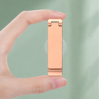 Support de téléphone universel pliable, adhésif, en alliage de zinc, support réglable portable pour smartphone, support de bureau