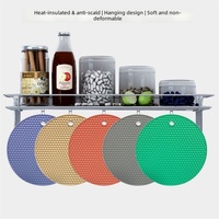 Sous-plat rond en silicone résistant à la chaleur et imperméable, texture nid d'abeille, antiadhésif, protection de table avec trou de suspension pour ustensiles de cuisine