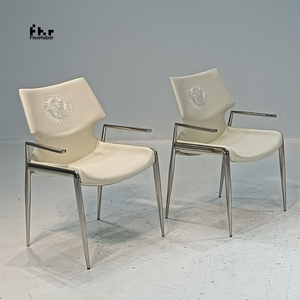 Customizable White Faux Leather Dining Armchair Stainless Steel Frame Wholesale for Commercial Use - Product Image 1