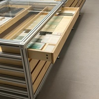 Système d'étagères modulaires en profilés d'aluminium de style industriel, autoportant, mural, réglable, avec tiroirs et éclairage LED