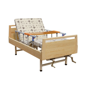 Cama de enfermería manual de madera maciza Nakatomi con barandilla para uso doméstico y médico - Product Image 1