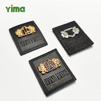Etiquettes gravées en cuir avec logo en relief en métal personnalisées Etiquettes de vêtement en cuir PU pour étiquette de jeans de marque patchs en cuir