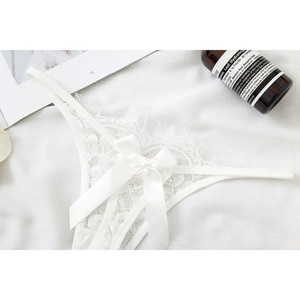 Vente directe d'usine de lingerie sexy en dentelle ajourée, tangas transparents très sexy, culottes taille basse à nœud papillon pour femmes. - Product Image 4