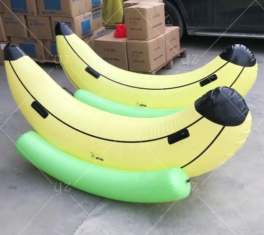 Hot Sale PVC Summer Fun Beach Water Toy Giant banana seesaw floating inflatable boat swimming pool seesaw game