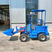 Chargeuse sur pneus multifonctionnelle à moteur diesel, mini-chargeuse hydraulique 4x4, pelle avant haute efficacité pour les chantiers de construction