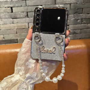 เคสฝาพับสุดหรูใหม่ล่าสุดเคสโทรศัพท์มือถือแวววาวแบบพับได้พร้อมสร้อยข้อมือมุกสำหรับ Samsung <span class=keywords><strong>Xiaomi</strong></span> Motorola - Product Image 2