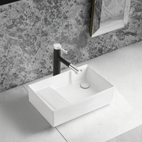Lavabo de salle de bain moderne en céramique à un seul bassin avec drainage latéral pour lavabo de balcon domestique