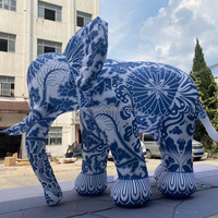 Modèle d'animal gonflable géant réaliste et accrocheur, éléphant gonflable de style traditionnel chinois avec motif floral pour les événements