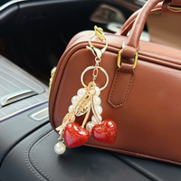 Schattig parelbandje hars hartvormig kersen sleutelhanger voor tas charme designer mode fruit hanger autosleutel hanger accessoires