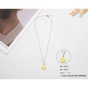 Collana con ciondolo a forma di toro dorato da 1,5 cm in acciaio inossidabile, ciondolo a doppia faccia per donna, gioielli alla moda - Product Image 2