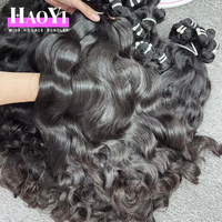 Cheveux bruts cambodgiens ondulés indiens, cheveux humains bruts vietnamiens alignés sur les cuticules, cheveux bruts birmans bouclés non traités, fournisseur de lots de cheveux bruts