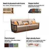 Canapé en cuir beige avec panneaux latéraux matelassés et coussins d'appoint orange |   Canapé de salon de luxe