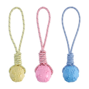 32cm bagged <b>macaron</b>-shaped TPR paw print balls for dogs, durable for chewing, teething, and tug-of-war. Wholesale pet supplies. - Product Image 1