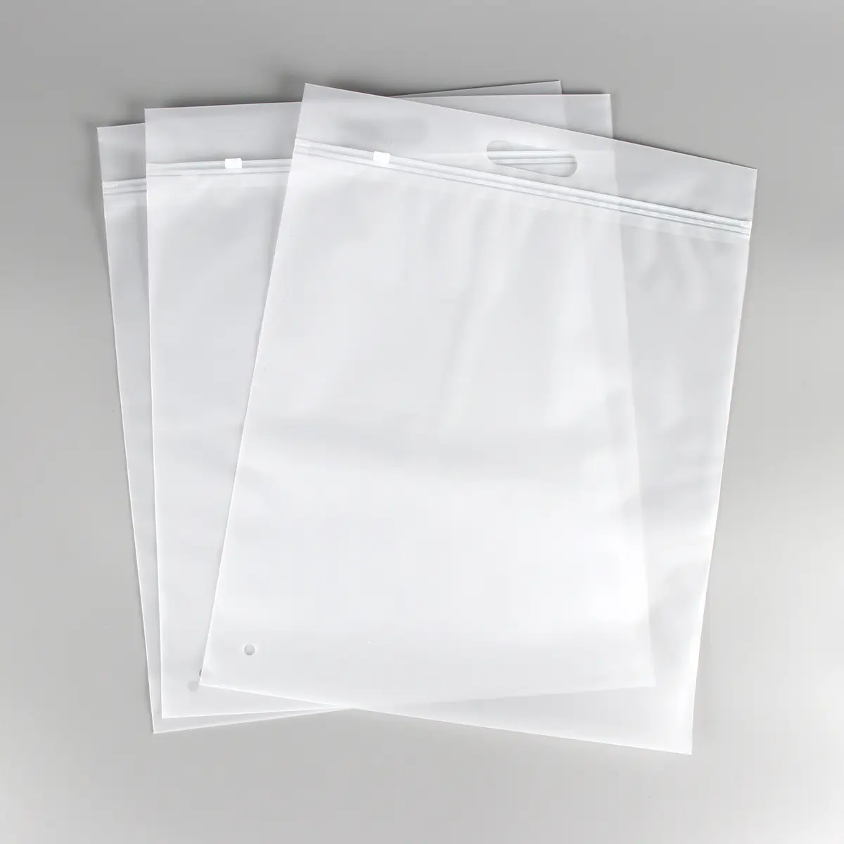 Bolsas ziplock de plástico con logotipo de impresión personalizada con asa para ropa bolsas de embalaje